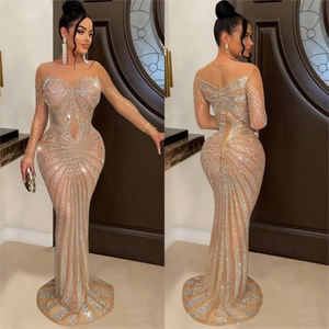 Sheer mesh evening gown with silver rhinestones, floor-length mermaid silhouette and cut-out
