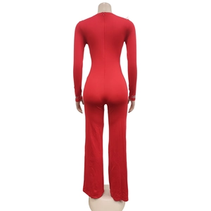 Detail view of red long sleeve jumpsuit back with rhinestones and zipper closure