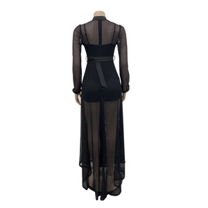 Detail view of black mesh sheer long sleeve jumpsuit with back zipper and waist ribbon