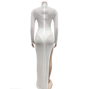 Detail of silver rhinestone stripes on white mesh evening dress with hidden back zipper