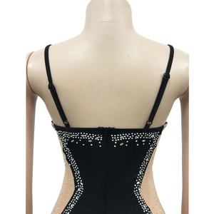 Detail of black dress with sparkling silver rhinestones and adjustable thin straps