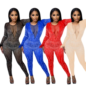 Detail of sheer mesh jumpsuits with V-neck, long sleeves and shimmering rhinestones