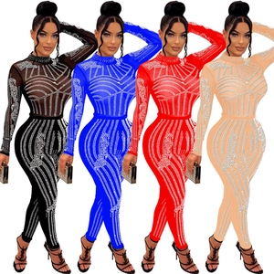 Detail view of sheer mesh jumpsuits with rhinestones in black, blue, red, and apricot
