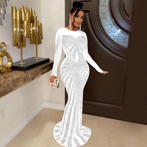 Detailed view of the luxury white floor-length evening dress with shimmering rhinestones