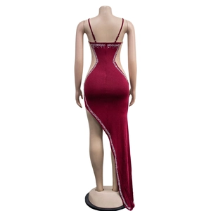 Detail view of burgundy evening dress back with sheer mesh panels and sparkling rhinestones