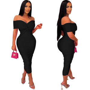 Detail of black off-shoulder midi dress with front twist knot and ruched chest design