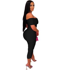 Side view of black off-the-shoulder midi dress featuring elegant ruched detailing
