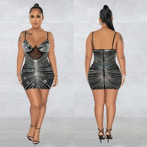 Detail of silver rhinestones and sheer mesh on black V-neck bodycon mini dress