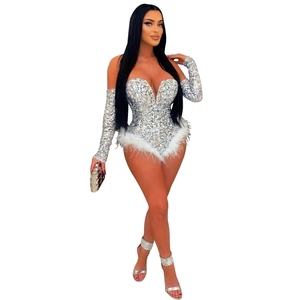 Silver sequin bodysuit detail featuring deep V-neckline and white feather trimming accents