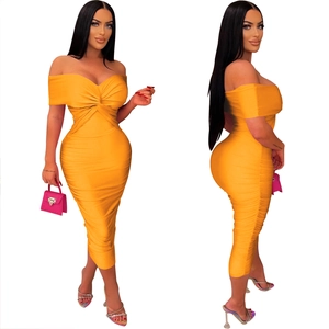 Front and side view of bright orange off-shoulder ruched midi bodycon dress with twist front