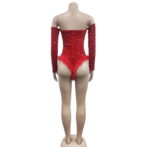 Detailed back view of red sequin romper with matching faux fur trim on legs