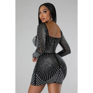 Detail of black mini dress featuring sparkling silver rhinestone geometric patterns and back view