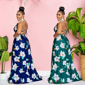 Detail of floral print maxi dresses in navy blue and dark green with halter back tie