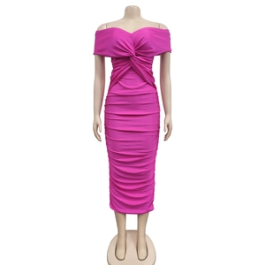 Detailed close-up of the twist knot detail and ruched fabric texture on a rose pink dress