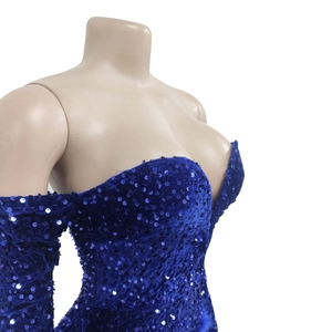 Detailed close-up of Royal Blue sequin fabric on an elegant off-shoulder evening dress