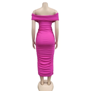 Detail view of the elegant ruched texture on the back of this hot pink maxi dress