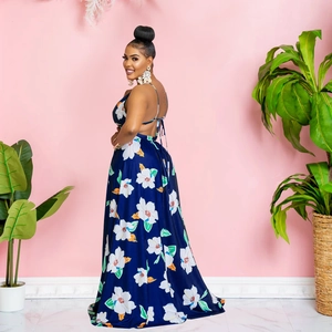 Detail view showing the open back and flowing floral print of the summer maxi dress