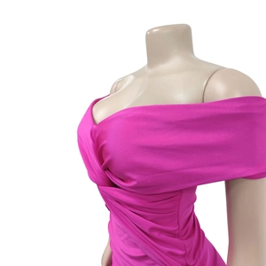 Detailed view of ruched sweetheart neckline on the rose pink strapless dress