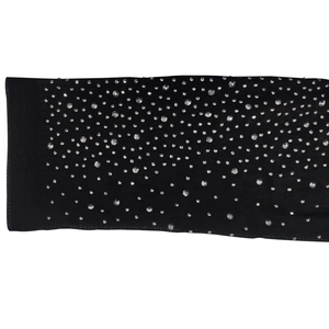 Detailed view of black mesh fabric with sparkling silver rhinestones and fine mesh texture