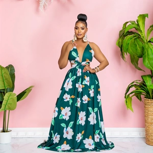 Detail of floral print maxi dress featuring deep V-neckline and waist cutout design