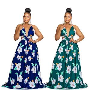 Detailed view of deep V-neck maxi dress with floral print and high waist in blue and green