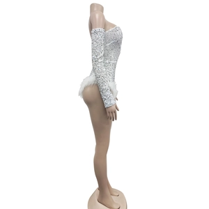 Detailed side view of white sequin romper with elegant faux feather waist trim decoration