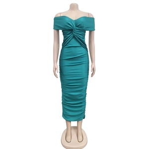Detail of teal strapless midi dress featuring pleated fabric and twisted bust design