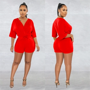 Front and back view of red V-neck romper with mid-length sleeves and drawstring waist