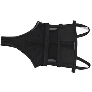 Detail of black mesh jumpsuit featuring sheer panels and cross-strap cut-out design