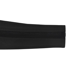 Detail showing high-elastic black fabric with sheer mesh side panels and flatlock stitching