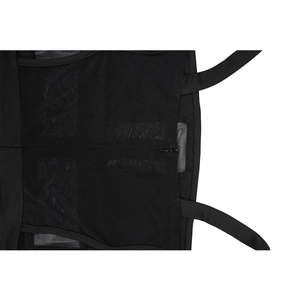 Detail of sheer mesh paneling and back zipper closure on black strap jumpsuit