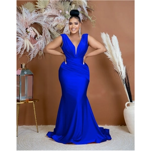 Detail of the elegant royal blue mermaid dress showing satin fabric and waist pleats