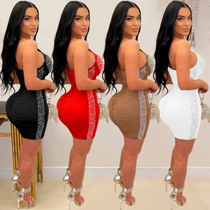 Sleeveless bodycon mini dress featuring rhinestone side trim in four color options