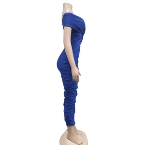 Detail view of royal blue strapless maxi dress showing pleated ruched side seam details