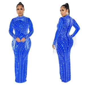 Detailed view of royal blue evening gown with silver rhinestones and long tassel sleeves