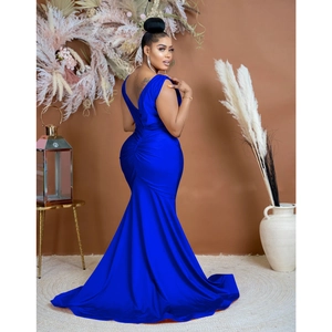 Detail of royal blue V-neck evening dress with open back and sleek mermaid fishtail silhouette
