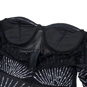 Detail view of black mesh dress with silver rhinestones and interior non-slip silicone strip