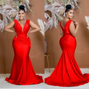 Elegant bright red V-neck sleeveless fishtail maxi dress with pleated waist detailing