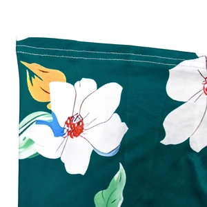 Close-up of floral print fabric showing neat double-stitching and high-quality finish