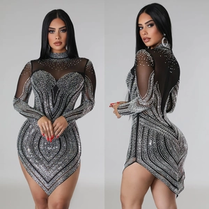 Black long sleeve mesh mini dress with sparkling silver rhinestones and high neck design