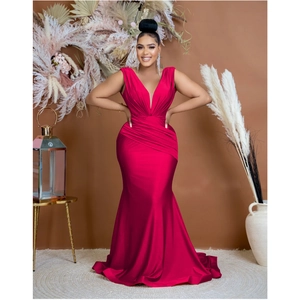Close-up of pleated satin texture on a rose red deep V-neck mermaid evening gown