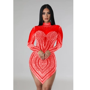 Detailed view of red rhinestone bodycon dress with sparkling heart pattern layout