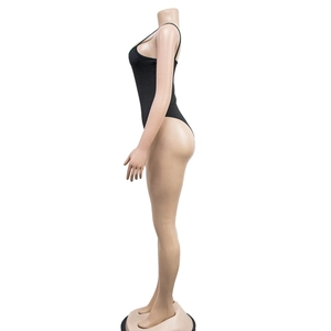 Side view of a black slim-fit mesh bodysuit with thin straps on a mannequin