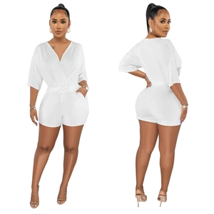 Front and back view of white V-neck playsuit with mid-sleeves and waist drawstring tie