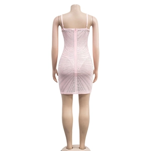 Detail of pink bodycon mini dress with silver rhinestones and back zipper closure