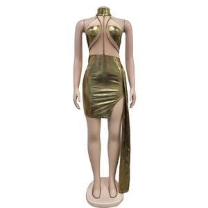 Detail of gold metallic halter mini dress with cutout bust and side cape ribbon