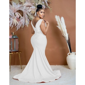 Detailed back view of white sleeveless V-neck evening gown with sleek ruched fishtail design