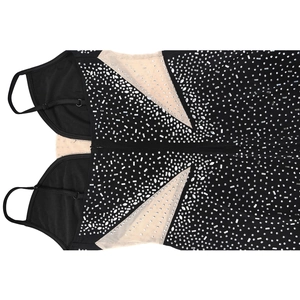 Close-up of black mesh dress featuring silver rhinestones and adjustable spaghetti straps