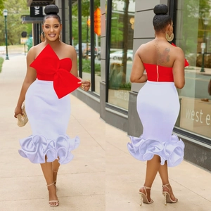 Chic two-piece set featuring a red bow bandeau top and white mermaid ruffle skirt for party