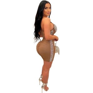 Close-up of brown bodycon mesh dress with silver rhinestones and side ruching detail